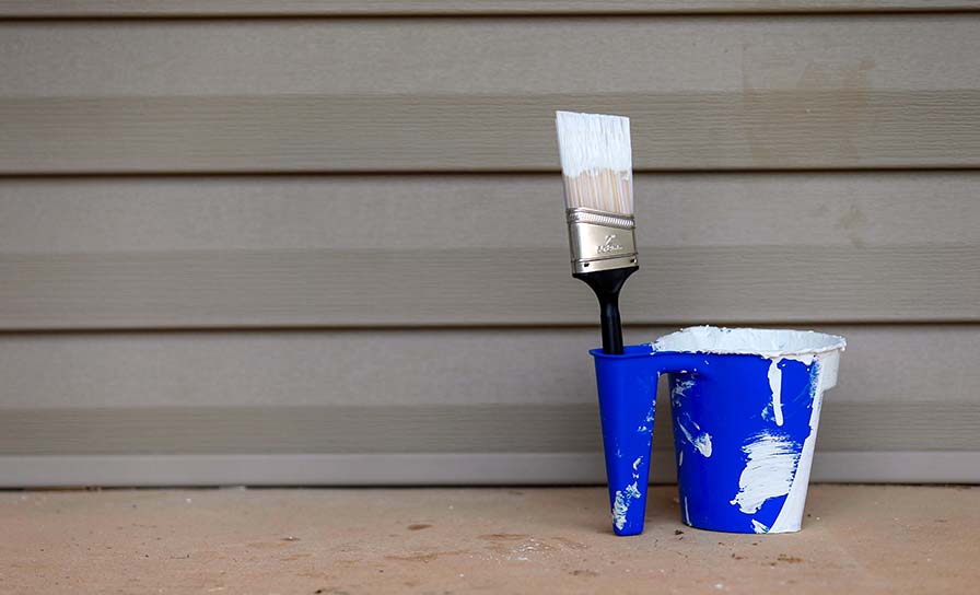Click here for more information about Paint brushes and bucket of paint